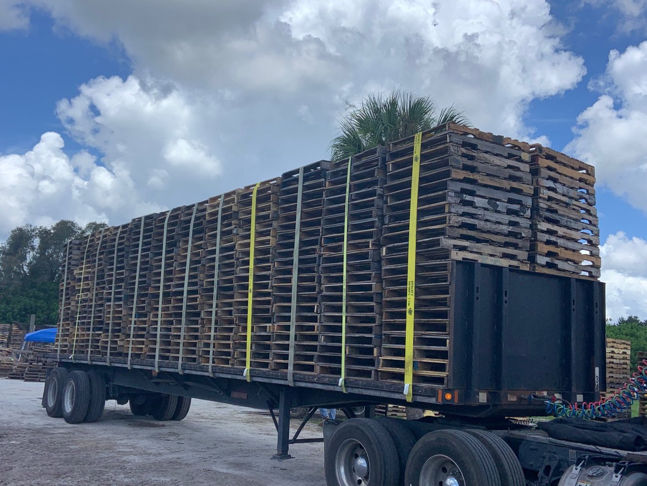 Dark flatbed pallet delivery