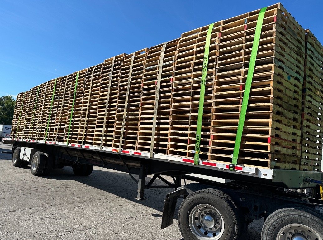 Green strap flatbed load