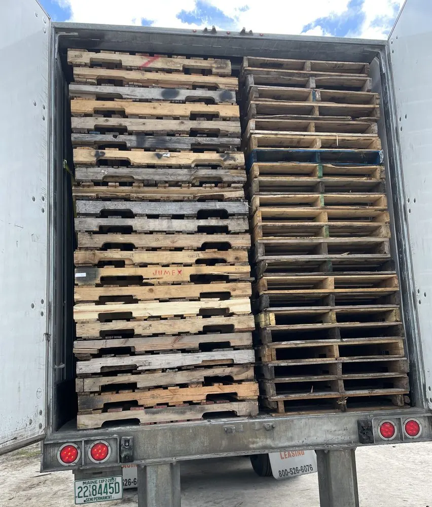 Used pallets loaded in a trailer ready for buy-back pickup by Florida Pallet Supply